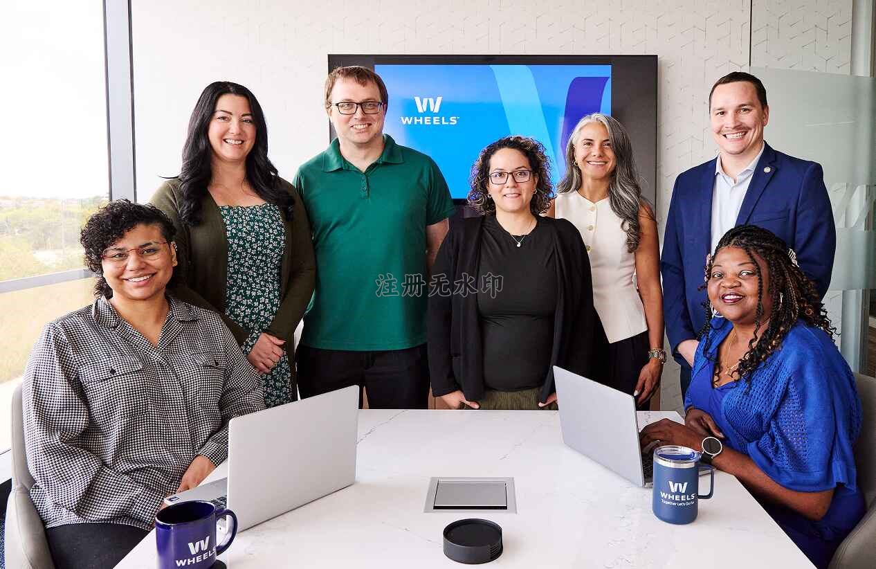 wheels employees in conference room